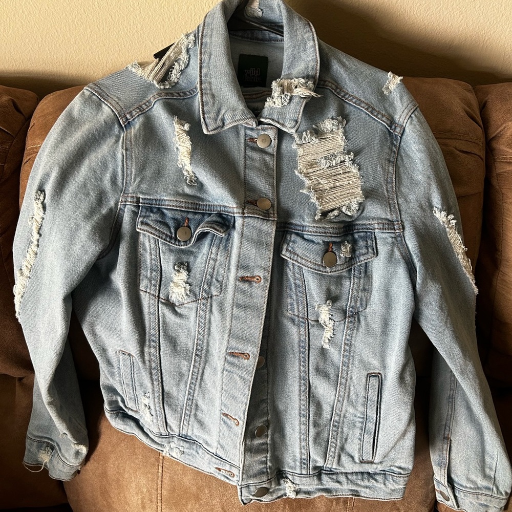 Jean Jacket styled with rips Target brand